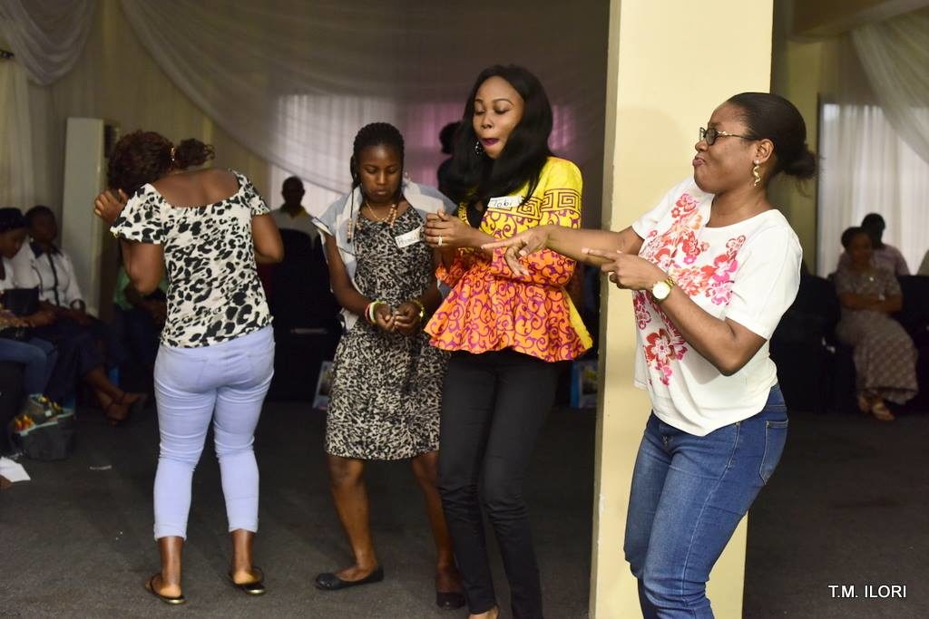 Women having fun dancing at hang out with tee event in Lagos women networking event