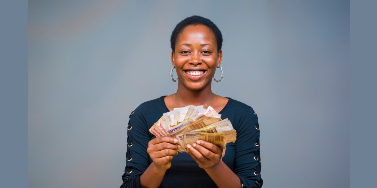 Woman happy after collecting her salary