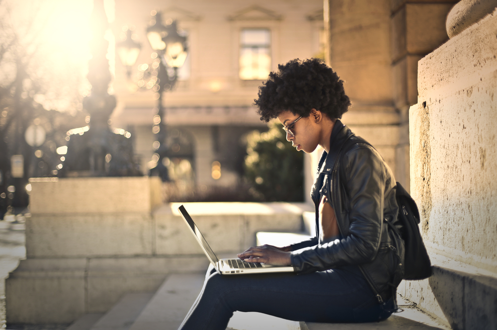 Young woman learning on her laptop