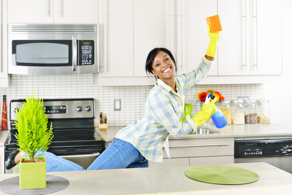 Woman happy to clean her home