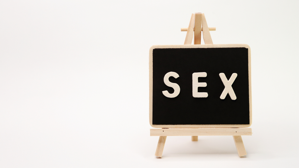Sex spelt out on a board