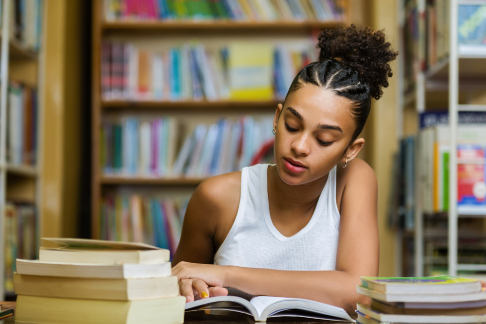 Black Female Professional Studying at Library